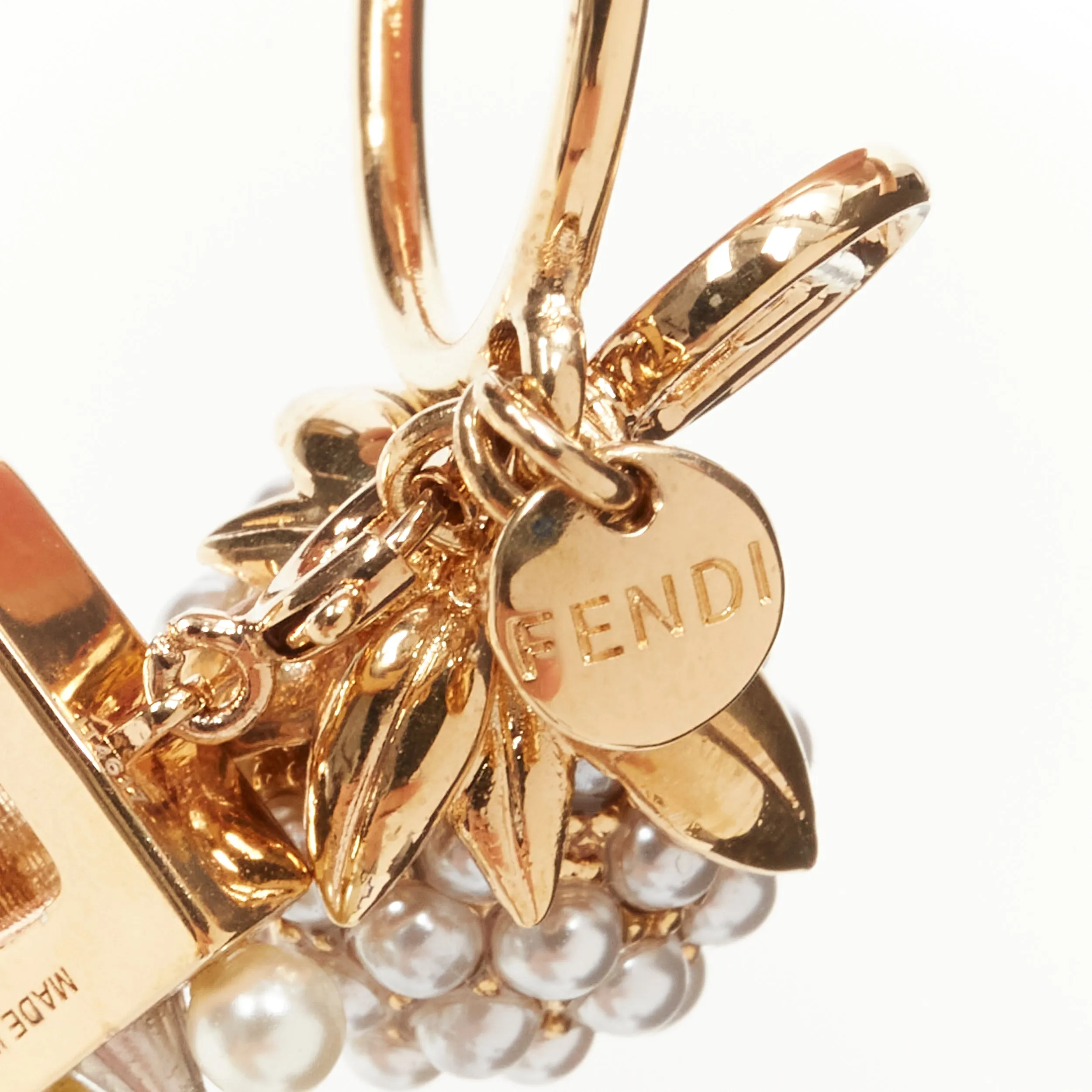 FENDI gold tone E alphabet pearl spike embellished berry charm ring