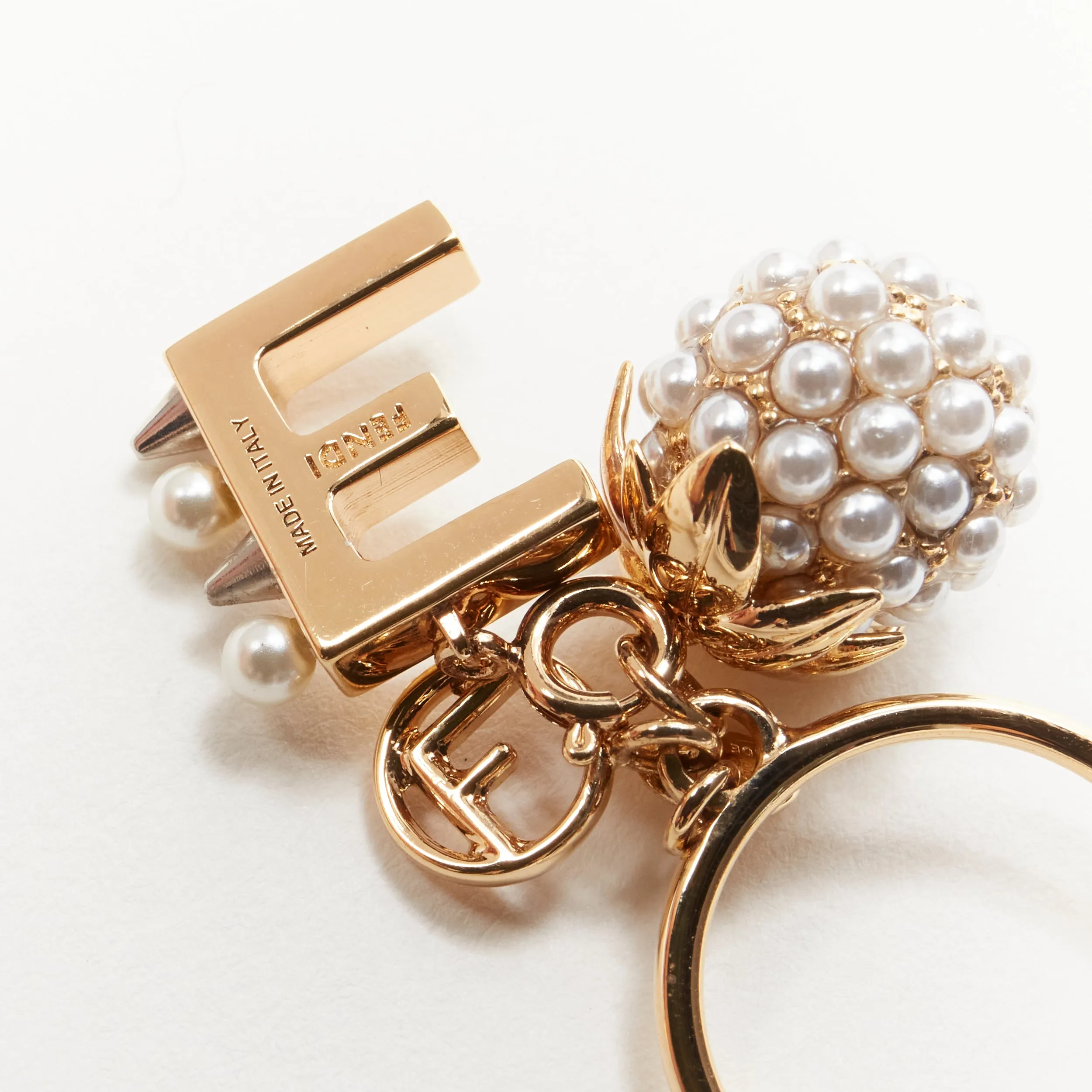 FENDI gold tone E alphabet pearl spike embellished berry charm ring